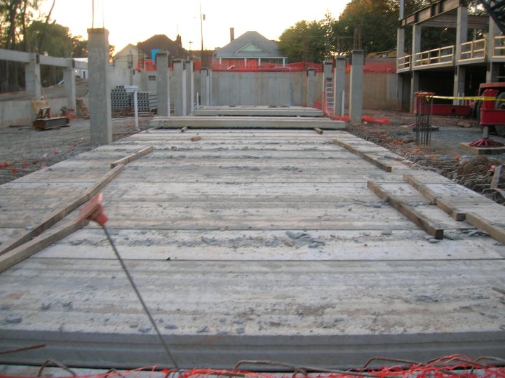 hollow-core planks covering the water containment vault